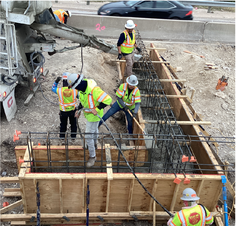 Northbound I-35 frontage road at Walnut Creek concrete placement - February 2024